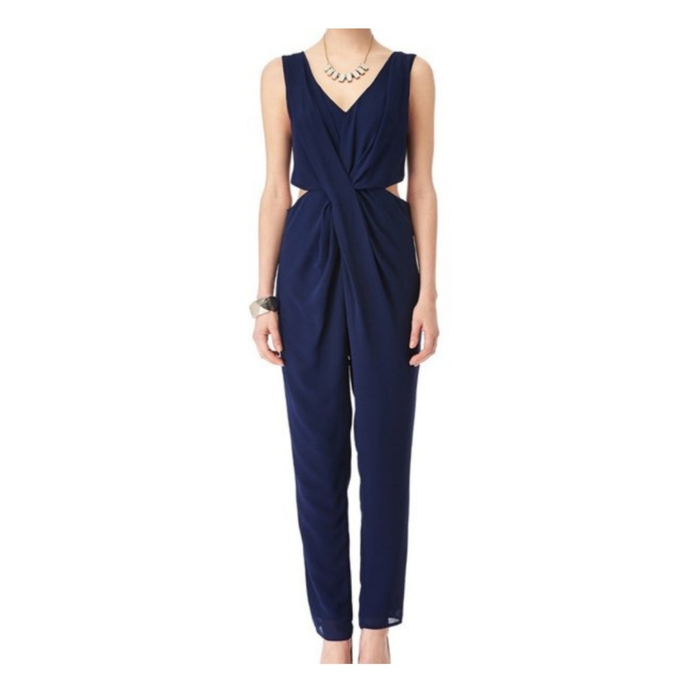 Naked Zebra | Twisted Front Cut Out Waist Jumpsuit - Picture 1 of 4
